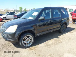 2002 Honda CR-V LX with VIN JHLRD68402C018458, listed as a IAAI auction lot 42206935 with 212,229 mi miles and . Bid and sale history available at carsss.com. Image 2.