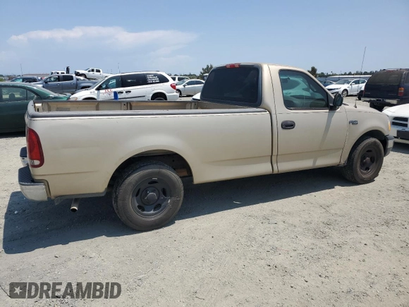 2000 Ford F-150 XL with VIN 1FTZF172XYNB65958, listed as a Copart auction lot 59946145 with 208,988 mi miles and Salvage title. Bid and sale history available at DreamBid. Image 3.