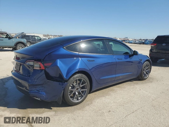 2022 Tesla Model 3 with VIN 5YJ3E1EA8NF322335, listed as a Copart auction lot 48187265 with 22,265 mi miles and Clean Title. Bid and sale history available at DreamBid. Image 3.