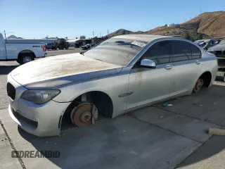 2011 BMW 7 Series 740i with VIN WBAKA4C55BC613072, listed as a Copart auction lot 87712105 with 137,048 mi miles and Clean Title. Bid and sale history available at carsss.com. Image 1.