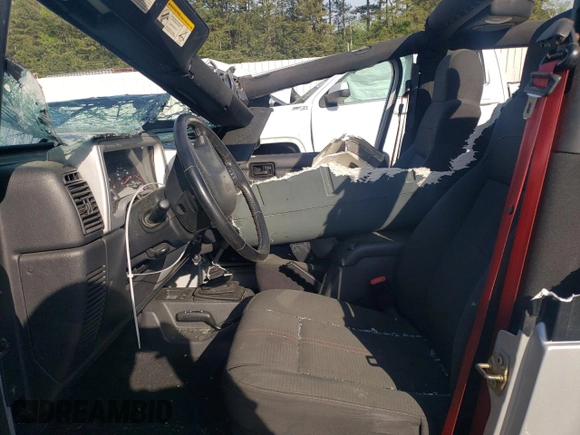 2003 Jeep Wrangler Rubicon z VIN 1J4FA69S53P375189, wystawiony jako Copart lot #54292035 z przebiegiem 55 863 mil mil oraz Szkoda całkowita • Salvage title. Historia ofert i sprzedaży dostępna na DreamBid. Obrazek 7.