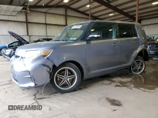 2011 Scion xB with VIN JTLZE4FE2B1119768, listed as a Copart auction lot 50708245 with 165,700 mi miles and Salvage Title. Bid and sale history available at carsss.com. Image 1.