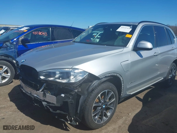 2016 BMW X5 eDrive xDrive40e with VIN 5UXKT0C58G0S76927, listed as a IAAI auction lot 41642438 with 78,312 mi miles. Bid and sale history available at carsss.com. Image 19.