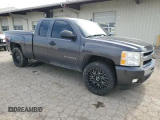 2010 Chevrolet Silverado 1500 LT with VIN 1GCSKSE33AZ114332, listed as a Copart auction lot 54046925 with 137,300 mi miles and Salvage Title. Bid and sale history available at DreamBid. Image 4.