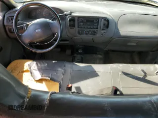 2003 Ford F-150 XL z VIN 2FTRX18W53CA92348, wystawiony jako Copart lot #56222285 z przebiegiem 266 068 mil mil oraz Szkoda całkowita • Salvage title. Historia ofert i sprzedaży dostępna na DreamBid. Obrazek 8.