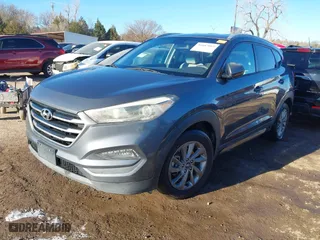 2016 Hyundai Tucson SE with VIN KM8J33A45GU089996, listed as a IAAI auction lot 41687069 with 129,957 mi miles. Bid and sale history available at carsss.com. Image 18.