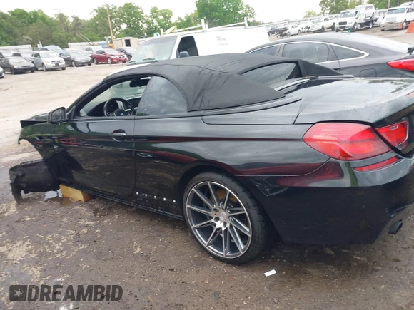 2014 BMW 6 Series 640i z VIN WBALW7C5XED595934, wystawiony jako IAAI lot #42092380 z przebiegiem Nie podano mil oraz . Historia ofert i sprzedaży dostępna na DreamBid. Obrazek 13.