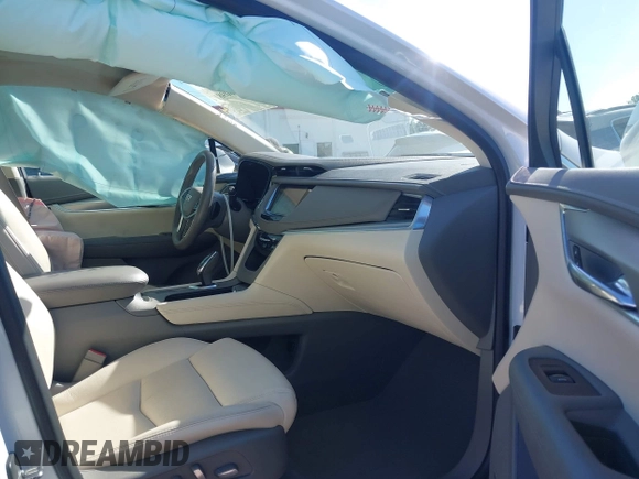 2017 Cadillac XT5 Luxury FWD with VIN 1GYKNBRS1HZ304062, listed as a IAAI auction lot 42460981 with 77,310 mi miles and . Bid and sale history available at DreamBid. Image 5.