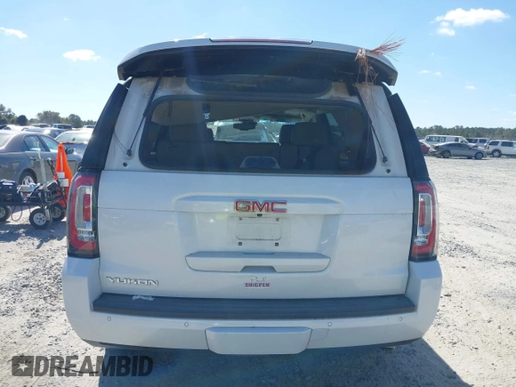 2019 GMC Yukon SLT with VIN 1GKS1BKC9KR332014, listed as a IAAI auction lot 40674460 with 76,545 mi miles. Bid and sale history available at carsss.com. Image 16.