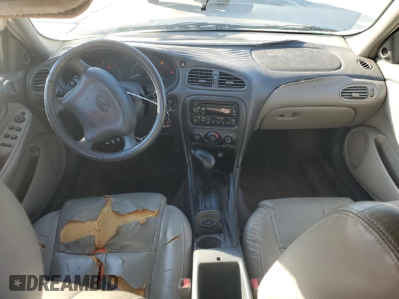 2000 Oldsmobile Alero GLS z VIN 1G3NF52E5YC322556, wystawiony jako Copart lot #85916554 z przebiegiem 169 600 mil mil oraz Szkoda całkowita • Salvage title. Historia ofert i sprzedaży dostępna na DreamBid. Obrazek 8.