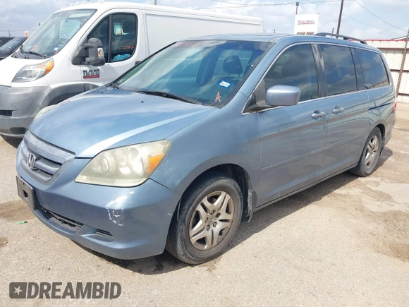 2007 Honda Odyssey EX-L with VIN 5FNRL38647B085123, listed as a IAAI auction lot 42154519 with 168,587 mi miles and . Bid and sale history available at carsss.com. Image 2.