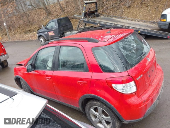 2011 Suzuki SX4 Crossover with VIN JS2YB5A39B6301570, listed as a IAAI auction lot 41666875 with 103,724 mi miles. Bid and sale history available at carsss.com. Image 14.