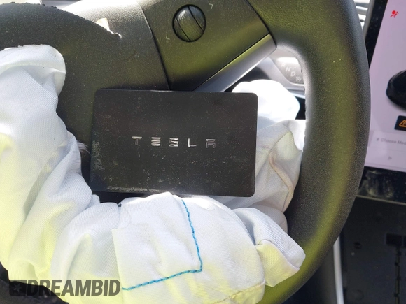 2020 Tesla Model 3 Standard Range Plus with VIN 5YJ3E1EA0LF660759, listed as a IAAI auction lot 41505250 with 63,322 mi miles and . Bid and sale history available at DreamBid. Image 11.