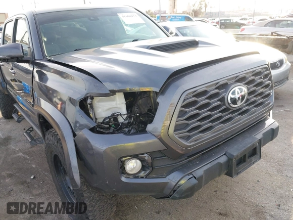 2021 Toyota Tacoma 4WD SR5 with VIN 3TMDZ5BN2MM108586, listed as a IAAI auction lot 41604953 with 65,422 mi miles. Bid and sale history available at carsss.com. Image 6.