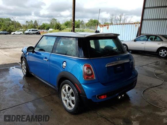 2009 MINI Hardtop S with VIN WMWMF73539TW83580, listed as a Copart auction lot 80143763 with 96,464 mi miles and Salvage Title. Bid and sale history available at DreamBid. Image 2.