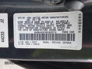2009 Toyota Corolla with VIN 1NXBU40E39Z065572, listed as a IAAI auction lot 42138980 with 195,822 mi miles. Bid and sale history available at carsss.com. Image 9.