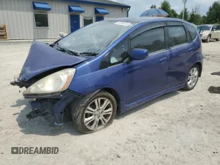 2009 Honda Fit Sport z VIN JHMGE88669S044785, wystawiony jako Copart lot #59184815 z przebiegiem 206 296 mil mil oraz Szkoda całkowita • Salvage title. Historia ofert i sprzedaży dostępna na DreamBid. Obrazek 1.