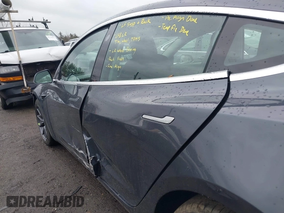 2019 Tesla Model 3 Mid Range with VIN 5YJ3E1EA3KF307415, listed as a IAAI auction lot 41673239 with 42,895 mi miles and . Bid and sale history available at DreamBid. Image 19.