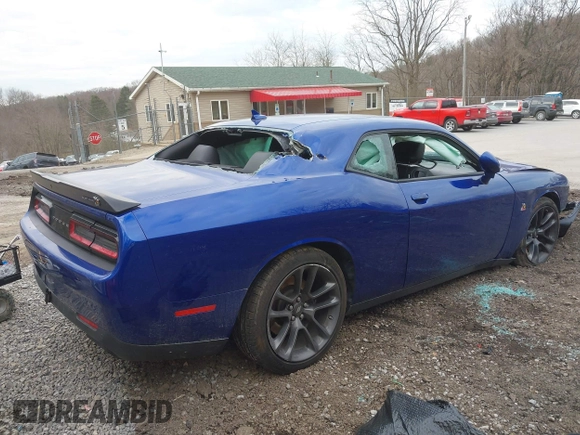 2021 Dodge Challenger R/T Scat Pack Widebody z VIN 2C3CDZFJXMH615361, wystawiony jako IAAI lot #41911374 z przebiegiem 27 159 mil mil oraz . Historia ofert i sprzedaży dostępna na DreamBid. Obrazek 4.