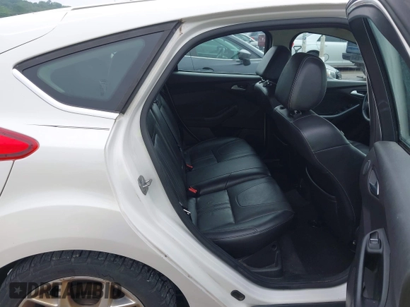 2014 Ford Focus Titanium with VIN 1FADP3N24EL184220, listed as a IAAI auction lot 42429610 with 172,575 mi miles and . Bid and sale history available at DreamBid. Image 8.