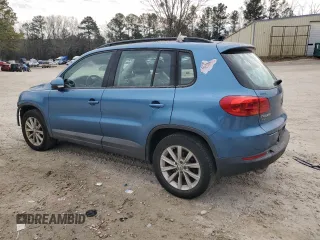 2017 Volkswagen Tiguan S with VIN WVGBV7AX2HK046312, listed as a Copart auction lot 42393295 with 94,814 mi miles and Salvage Title. Bid and sale history available at DreamBid. Image 2.