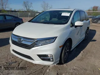 2020 Honda Odyssey Elite with VIN 5FNRL6H92LB014671, listed as a IAAI auction lot 42110389 with 104,180 mi miles and . Bid and sale history available at DreamBid. Image 17.