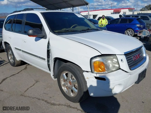 2002 GMC Envoy SLT with VIN 1GKDS13S522216498, listed as a IAAI auction lot 41642757 with 164,981 mi miles. Bid and sale history available at carsss.com. Image 1.