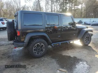 2016 Jeep Wrangler Unlimited Rubicon with VIN 1C4HJWFG9GL220687, listed as a Copart auction lot 48545685 with 49,474 mi miles and Salvage Title. Bid and sale history available at carsss.com. Image 3.