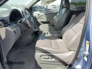 2008 Honda Odyssey EX-L z VIN 5FNRL38738B037025, wystawiony jako Copart lot #53354455 z przebiegiem 161 291 mil mil oraz Szkoda całkowita • Salvage title. Historia ofert i sprzedaży dostępna na DreamBid. Obrazek 7.