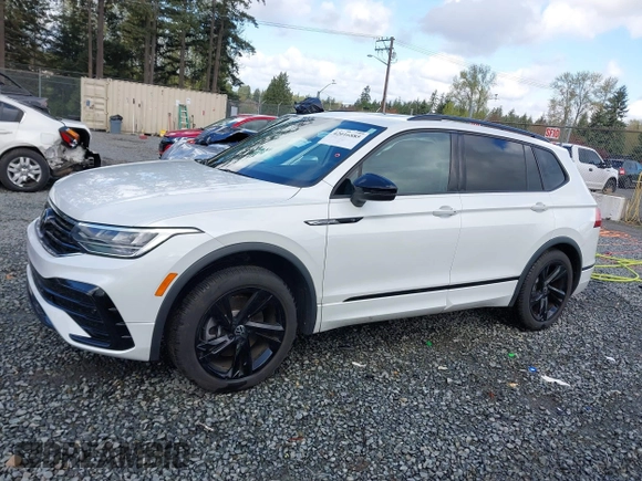 2023 Volkswagen Tiguan SE R-Line Black with VIN 3VVCB7AX3PM014446, listed as a IAAI auction lot 42016885 with 12,726 mi miles and . Bid and sale history available at DreamBid. Image 14.