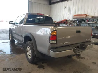 2000 Toyota Tundra SR5 with VIN 5TBBT4410YS040624, listed as a IAAI auction lot 41754230 with 225,472 mi miles. Bid and sale history available at carsss.com. Image 3.