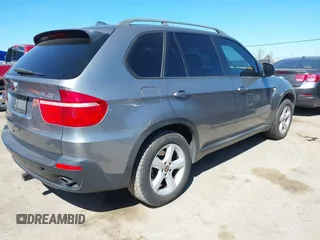 2008 BMW X5 3.0si with VIN 5UXFE43598L022453, listed as a IAAI auction lot 41852297 with 185,528 mi miles. Bid and sale history available at carsss.com. Image 4.