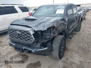 2022 Toyota Tacoma SR5 with VIN 3TMAZ5CN6NM186713, listed as a IAAI auction lot 42607719 with 60,704 mi miles and . Bid and sale history available at DreamBid. Image 17.