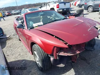 2004 Ford Mustang Deluxe with VIN 1FAFP44614F134665, listed as a IAAI auction lot 41850783 with 1 mi miles. Bid and sale history available at carsss.com. Image 1.