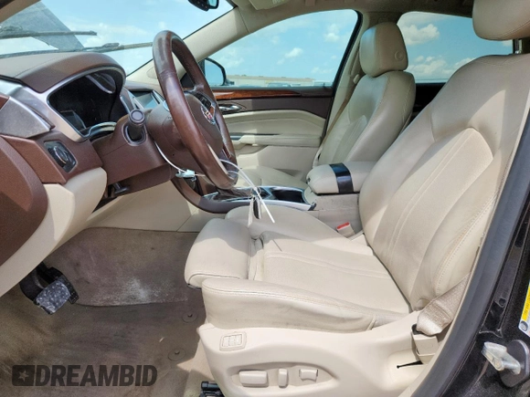 2015 Cadillac SRX Performance Collection with VIN 3GYFNCE34FS574161, listed as a Copart auction lot 60151945 with 108,844 mi miles and Salvage title. Bid and sale history available at DreamBid. Image 7.