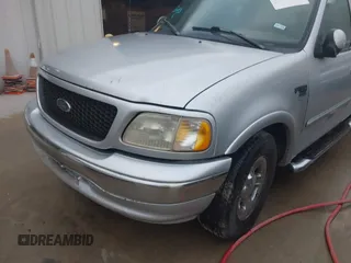 2003 Ford F-150 XL with VIN 2FTRX17223CA73626, listed as a IAAI auction lot 42027926 with 127,614 mi miles. Bid and sale history available at carsss.com. Image 6.