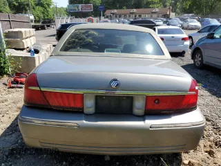 2000 Mercury Grand Marquis LS z VIN 2MEFM75W7YX694301, wystawiony jako Copart lot #57225295 z przebiegiem 141 420 mil mil oraz Szkoda całkowita • Salvage title. Historia ofert i sprzedaży dostępna na DreamBid. Obrazek 6.