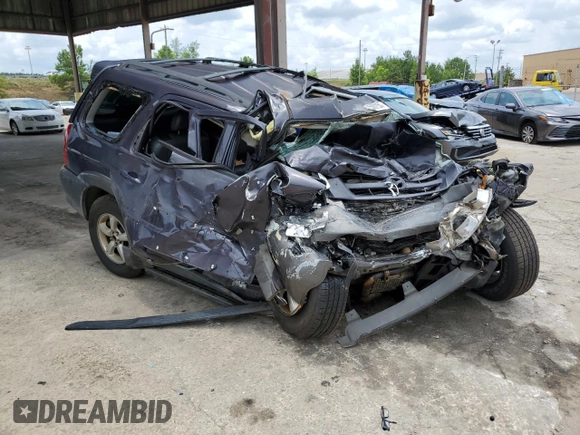 2005 Mazda Tribute S with VIN 4F2CZ06155KM32663, listed as a Copart auction lot 58622554 with 225,000 mi miles and Salvage Title. Bid and sale history available at DreamBid. Image 4.