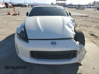 2014 Nissan 370Z Nismo with VIN JN1AZ4EH0EM635111, listed as a Copart auction lot 87292134 with 185,356 mi miles and Salvage Title. Bid and sale history available at DreamBid. Image 5.
