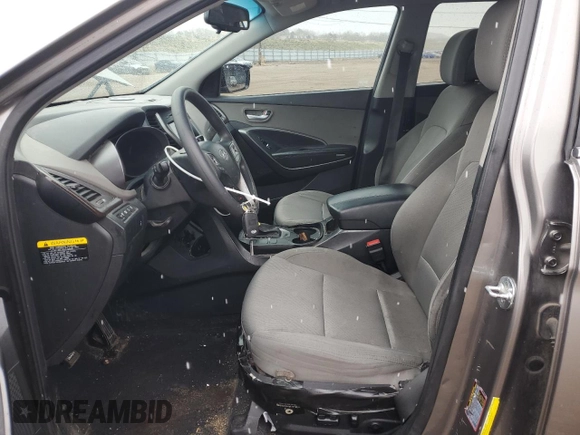 2017 Hyundai Santa Fe 2.4L z VIN 5NMZUDLB7HH030253, wystawiony jako Copart lot #51302445 z przebiegiem 136 074 mil mil oraz Szkoda całkowita • Salvage title. Historia ofert i sprzedaży dostępna na DreamBid. Obrazek 7.