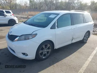 2012 Toyota Sienna SE with VIN 5TDXK3DC1CS221798, listed as a IAAI auction lot 41989210 with 198,962 mi miles. Bid and sale history available at carsss.com. Image 2.