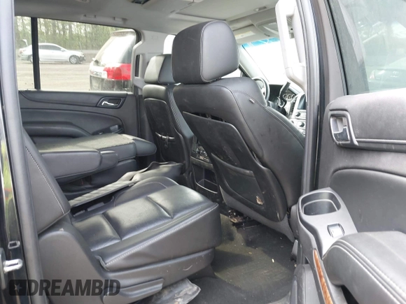 2015 Chevrolet Suburban LTZ with VIN 1GNSKKKC6FR637086, listed as a IAAI auction lot 42104826 with 79,986 mi miles and . Bid and sale history available at DreamBid. Image 8.