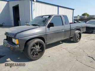 1991 Nissan Frontier with VIN 1N6SD16S3MC329465, listed as a Copart auction lot 74907924 with 140,919 mi miles and Salvage title. Bid and sale history available at DreamBid. Image 1.
