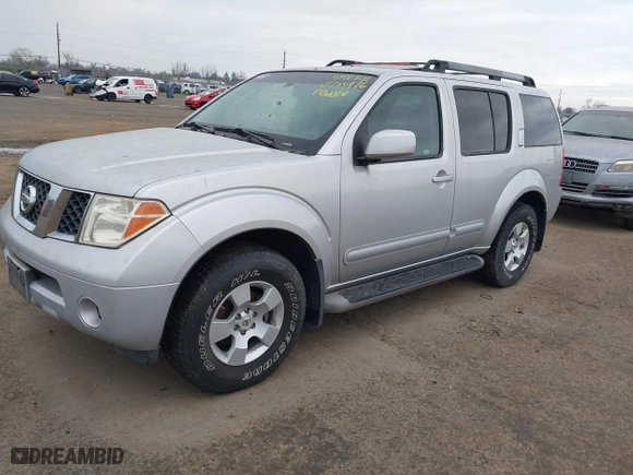 2006 Nissan Pathfinder SE with VIN 5N1AR18U46C604709, listed as a IAAI auction lot 41735976 with 123,548 mi miles. Bid and sale history available at carsss.com. Image 2.