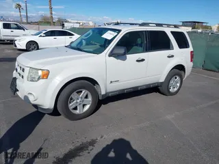 2009 Ford Escape Hybrid with VIN 1FMCU49349KA19086, listed as a IAAI auction lot 41704934 with 91,047 mi miles. Bid and sale history available at carsss.com. Image 2.