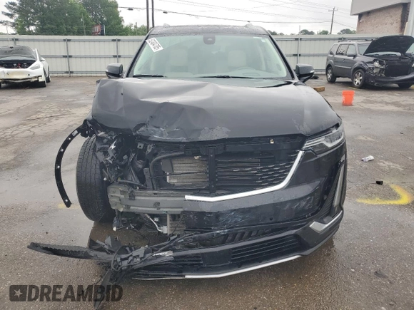 2023 Cadillac XT6 AWD Premium Luxury z VIN 1GYKPDRS8PZ119320, wystawiony jako Copart lot #52404785 z przebiegiem 41 629 mil mil oraz Szkoda całkowita • Salvage title. Historia ofert i sprzedaży dostępna na DreamBid. Obrazek 5.