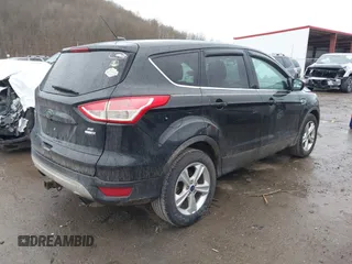 2015 Ford Escape SE with VIN 1FMCU9G95FUA27587, listed as a IAAI auction lot 41715978 with 114,482 mi miles. Bid and sale history available at carsss.com. Image 4.