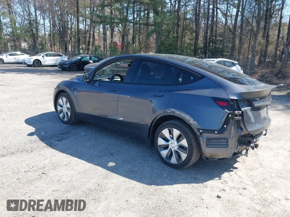 2021 Tesla Model Y Long Range with VIN 5YJYGDEE4MF119249, listed as a IAAI auction lot 41764711 with 87,796 mi miles. Bid and sale history available at carsss.com. Image 3.