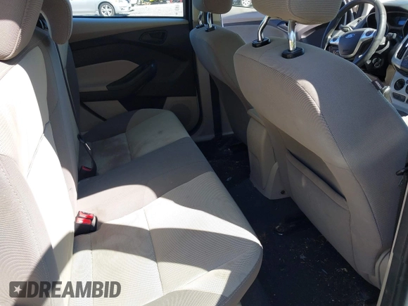 2012 Ford Focus SE with VIN 1FAHP3F27CL218986, listed as a IAAI auction lot 42633997 with 163,414 mi miles and . Bid and sale history available at DreamBid. Image 8.