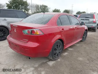 2015 Mitsubishi Lancer ES with VIN JA32U2FU6FU025259, listed as a IAAI auction lot 41345564 with 184,953 mi miles. Bid and sale history available at carsss.com. Image 4.